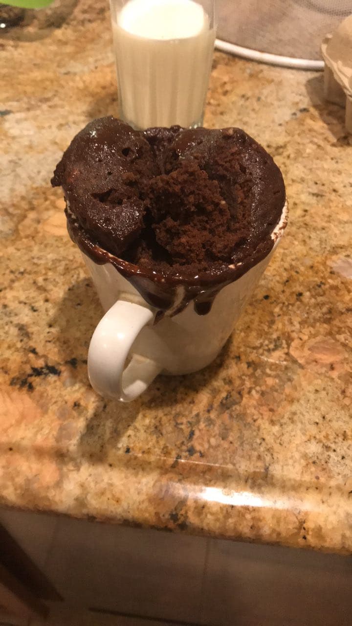 picture of a terrible looking chocolate cupcake cooked in a mug