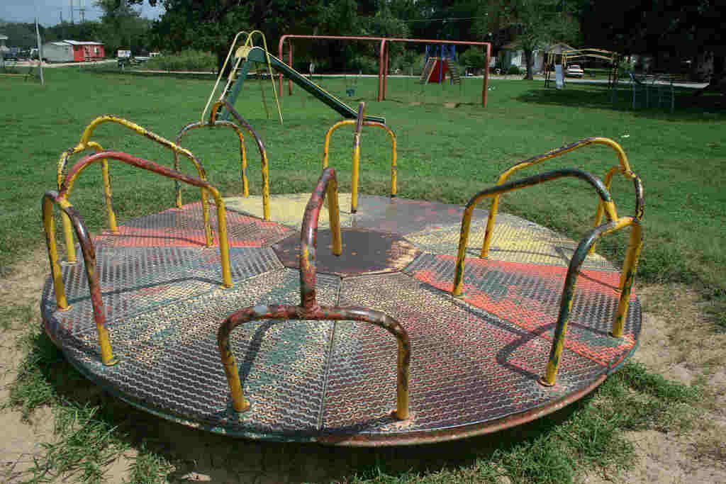 old beaten up merry go round found
              in old schools